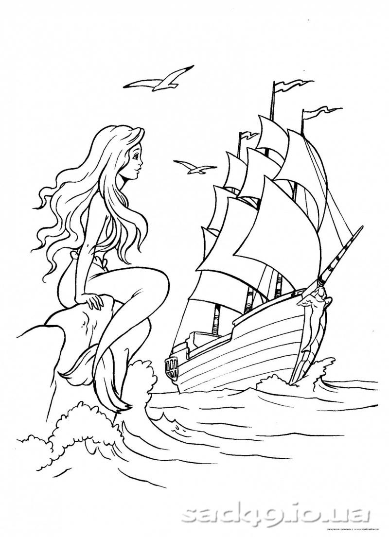 Розмальовки казками Сидить русалка на скелі а повз по хвилях пливе корабель і в небі літають чайки